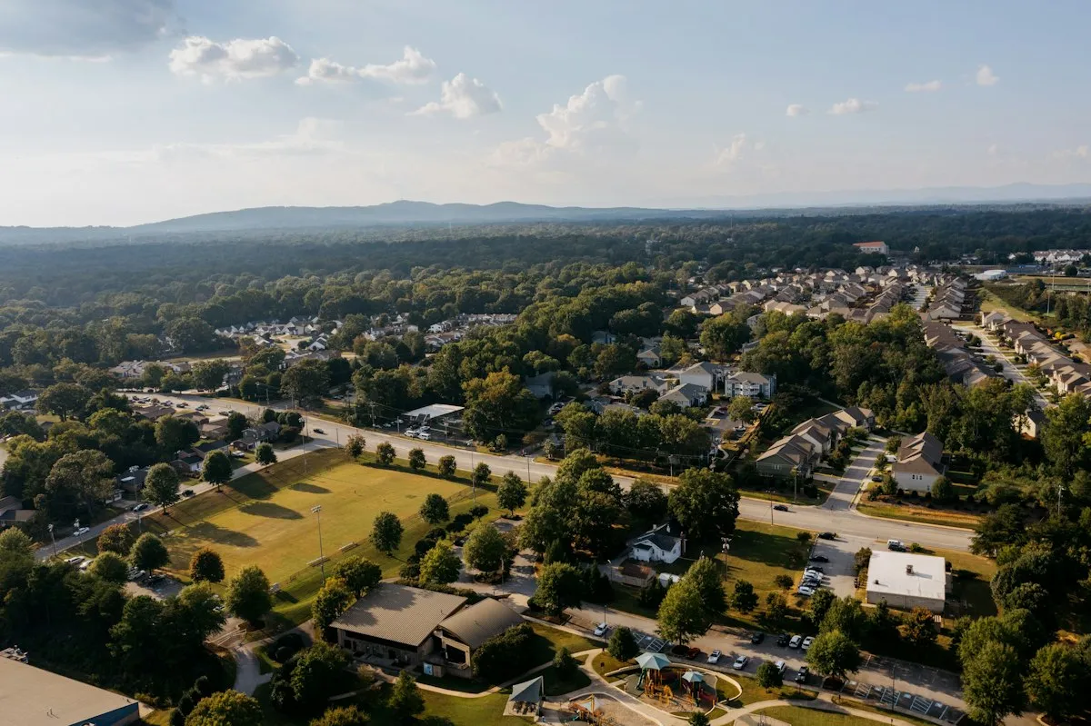 Aerial view of a Denver-area suburban neighborhood with mountains, Highlands Ranch Realtor Simon Dzienis market update
