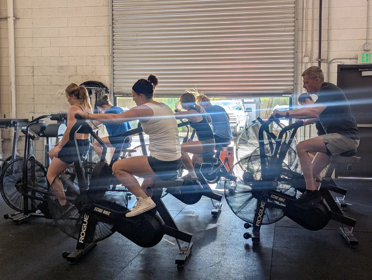 CrossFit HiFi members doing Echo bike work during class