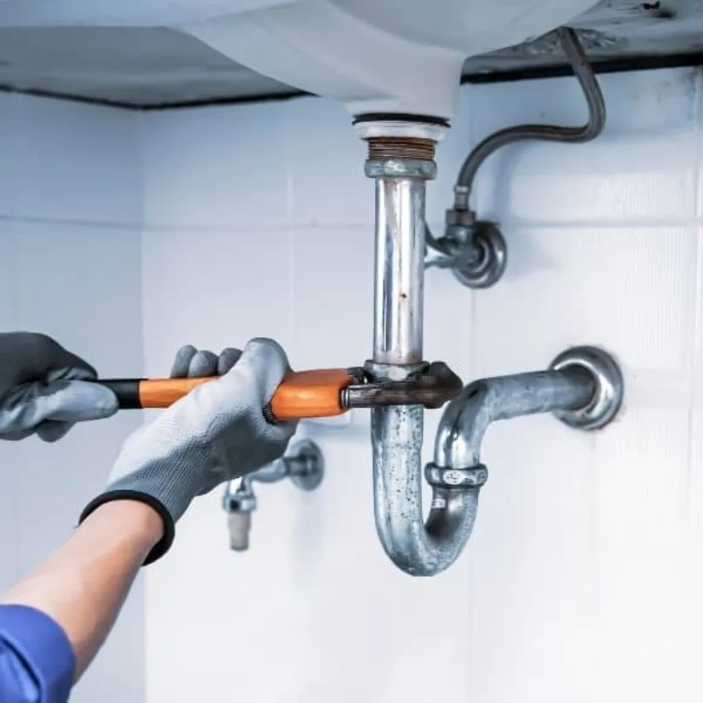Under-sink pipe repair and plumbing maintenance