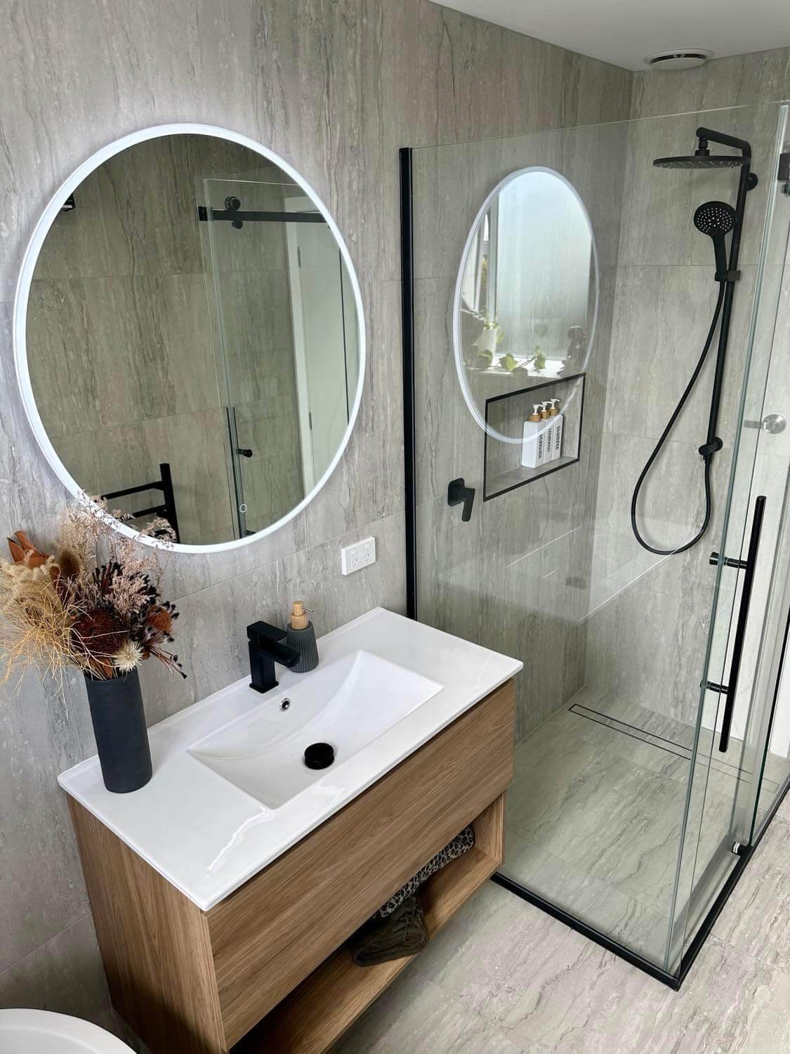 Bathroom renovation in Gore Southland with tiled walls and modern vanity