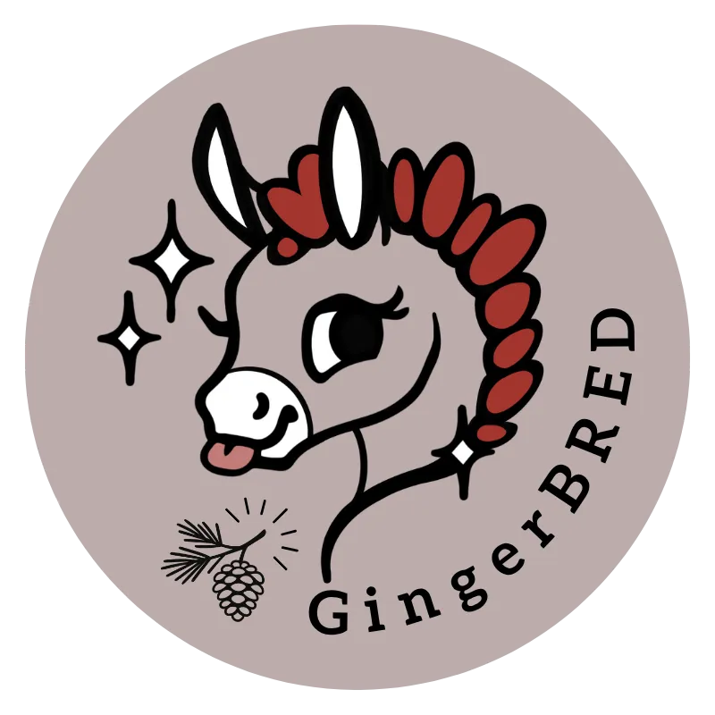 Man with glasses thinks in front of chalkboard.