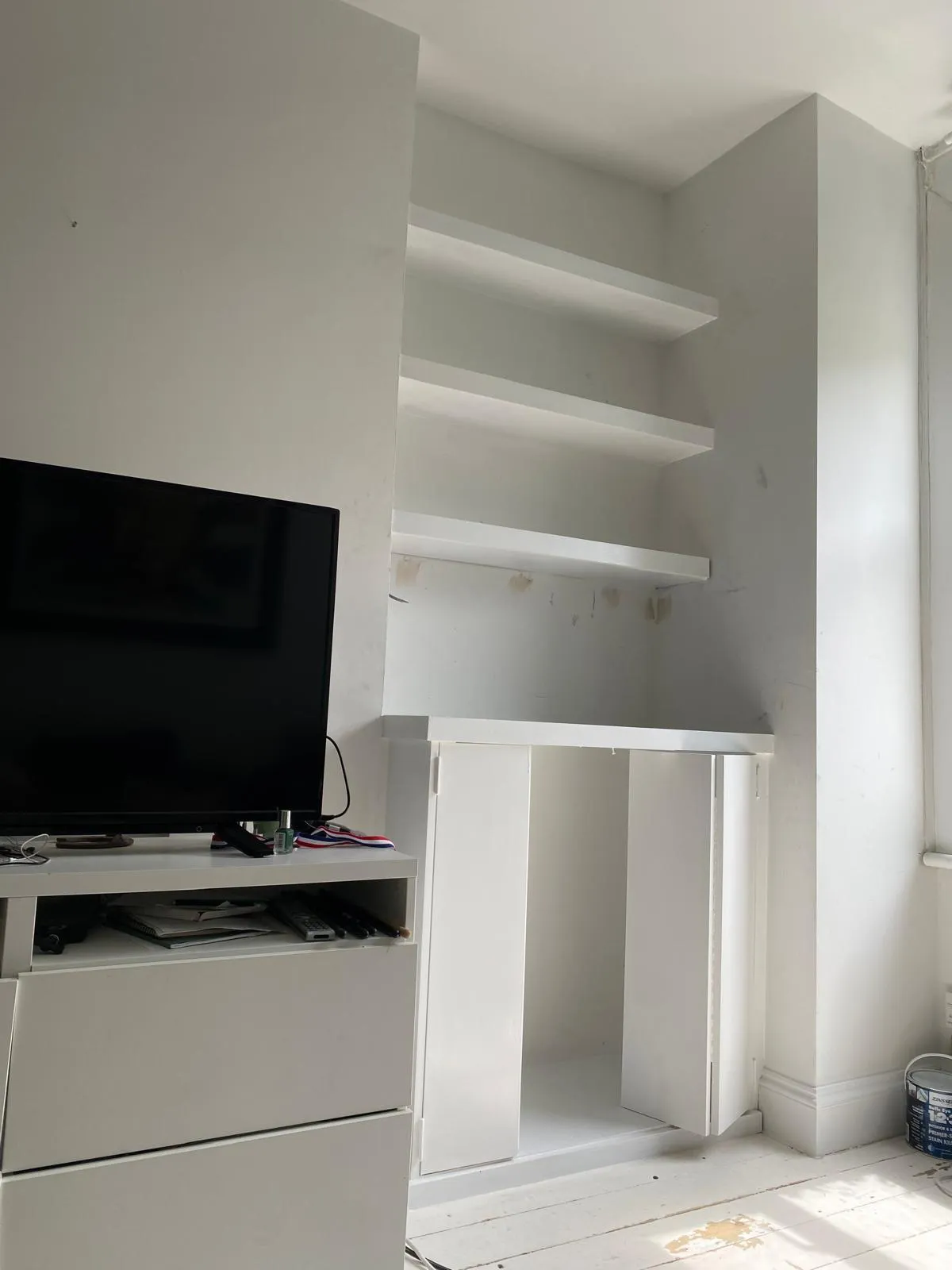 alcove units and shelving painted and decorated in surrey home