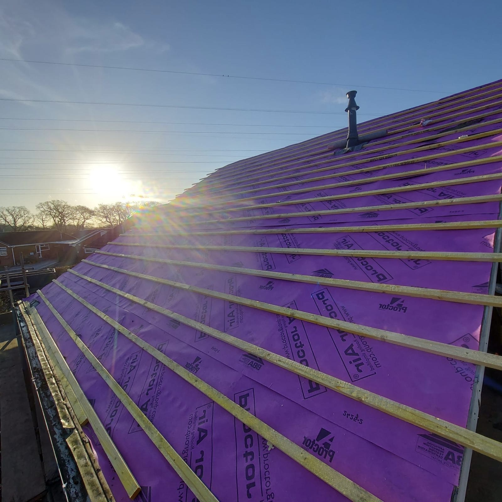 A weathered grey Victorian door in Epsom with flaking paint, prepared for professional timber restoration and a weather-resistant finish.
