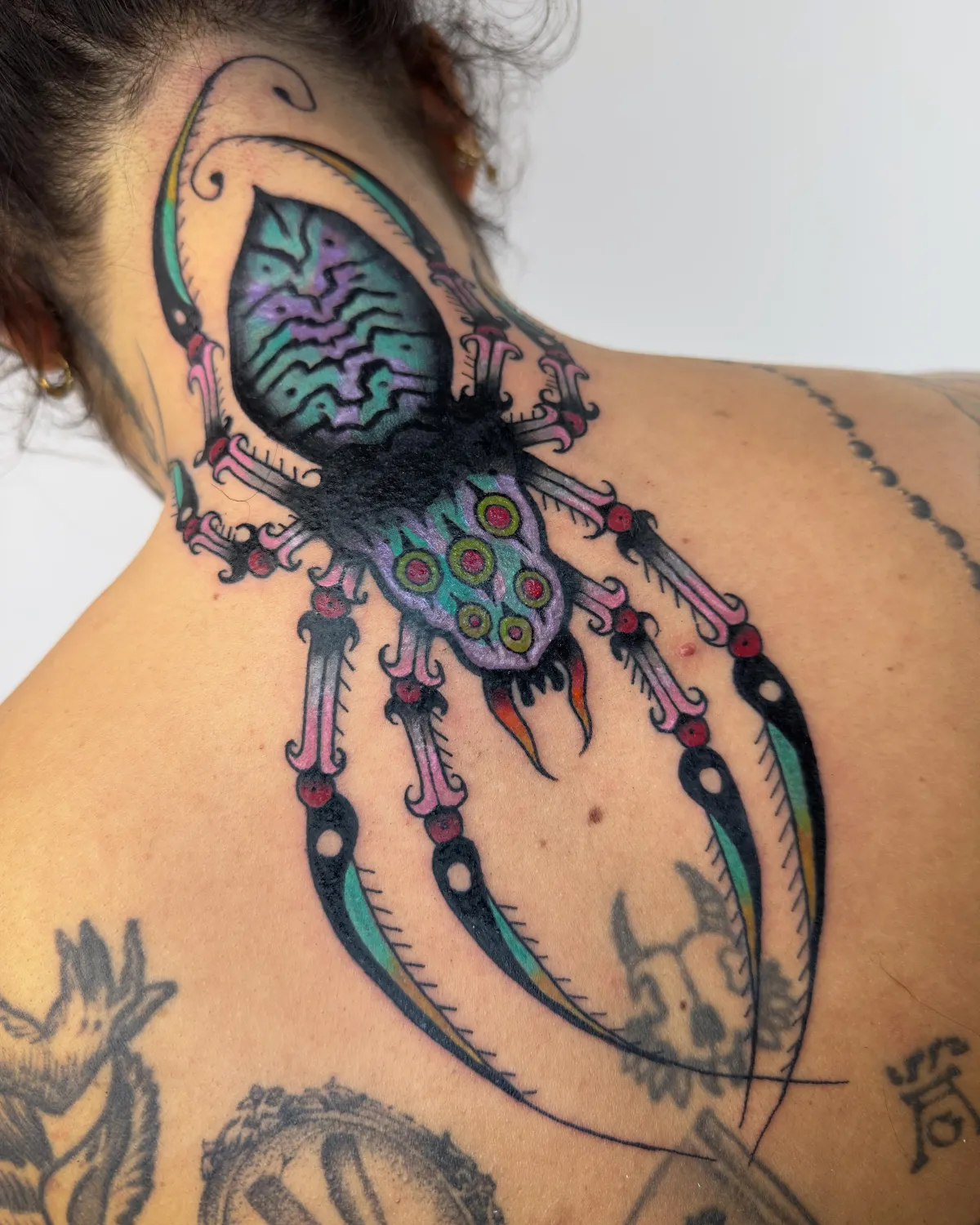 person with tattoo on right arm