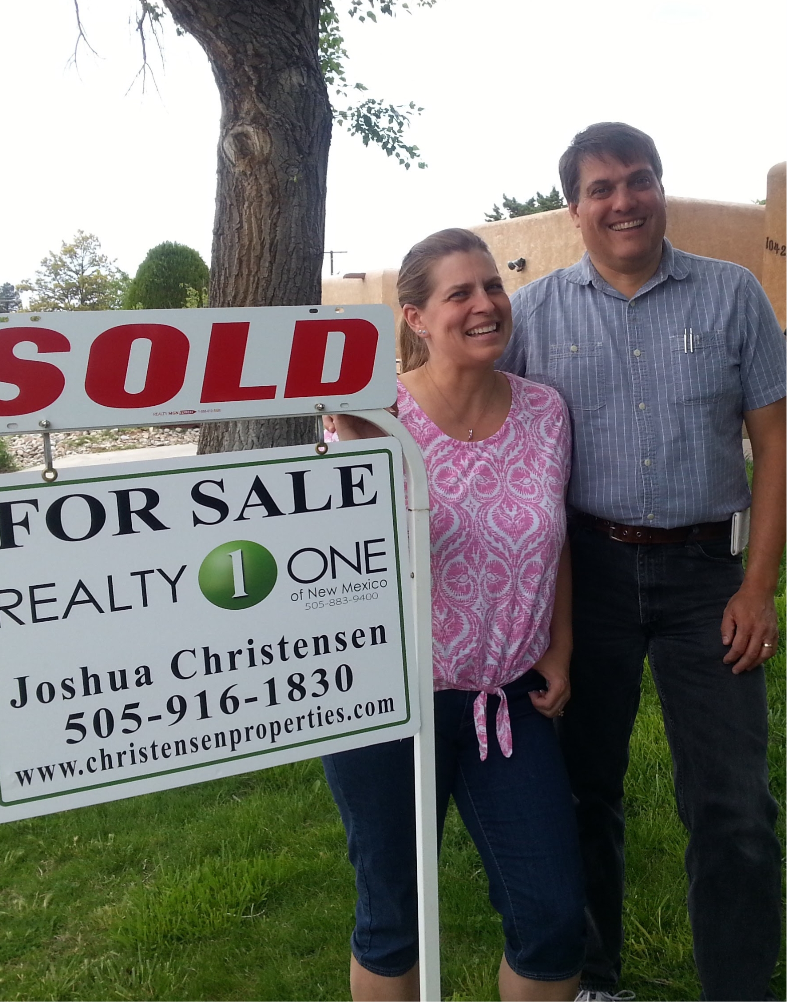 Albuquerque homeowners celebrating a successful home sale with Christensen Properties