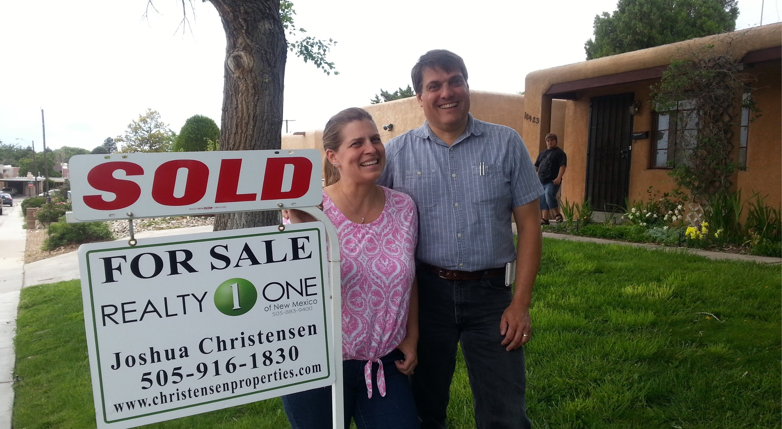 Albuquerque homeowners celebrating a successful home sale with Christensen Properties