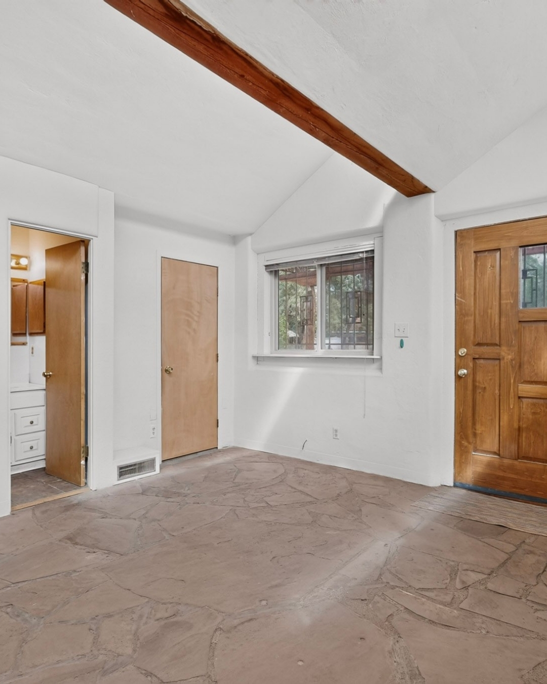 Dining area with wood ceiling and East Mountain views at 51 Wolf Trail in Edgewood