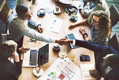 Expatriate business owner with consultant for expat finance