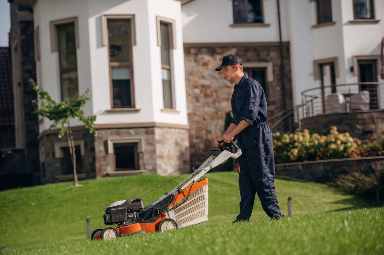 Professional lawn care service maintaining a healthy residential lawn in Asheville NC