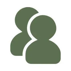 Instructor offering one-to-one goal consultation for beginner martial artists