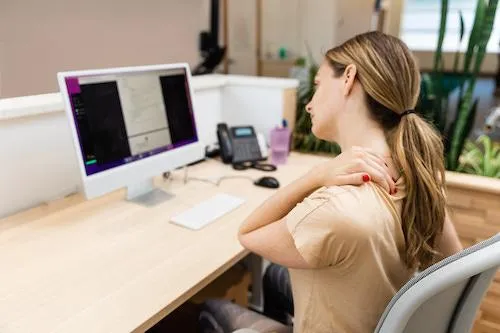 brown and gray stone stack on beach shore during daytime