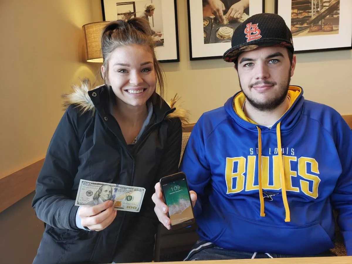 a blurry photo of two people on a motorcycle