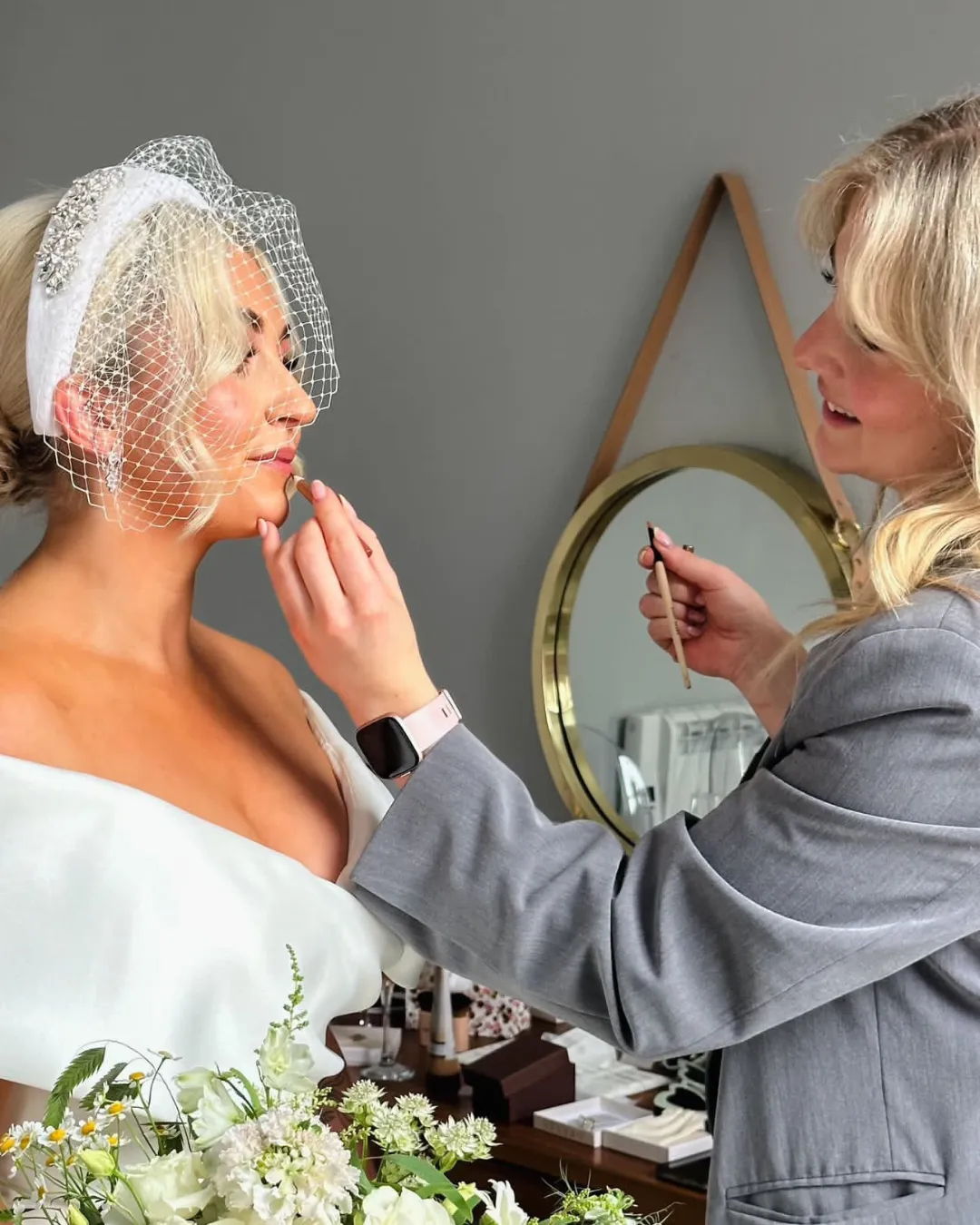 Meet Emily Snow - applying make up to a bride on her wedding day