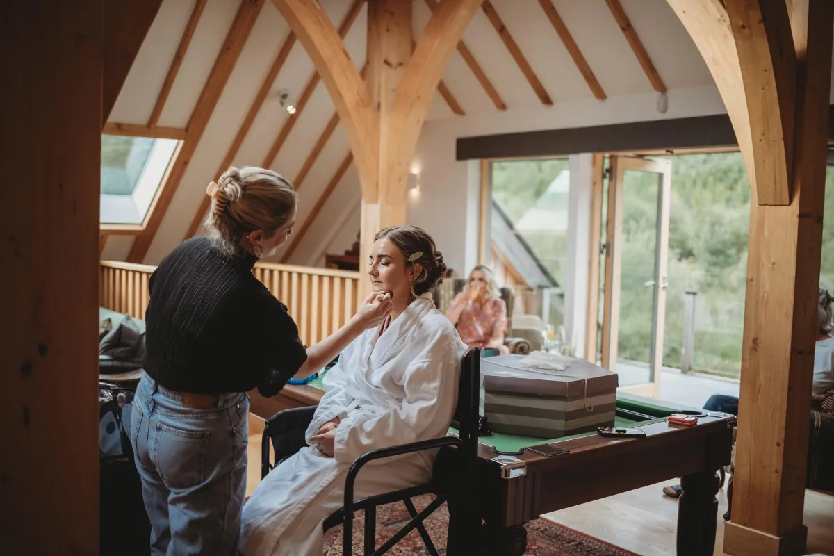 Emily doing a brides make up on her wedding day