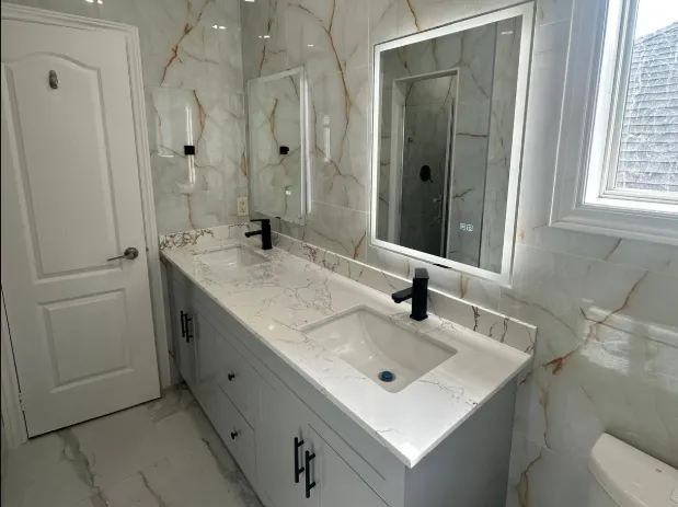 Bathroom remodeling project with modern fixtures and updated finishes