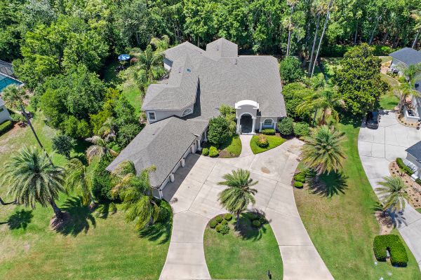 347 Clearwater Drive in Ponte Vedra Beach, a 4,707 square foot home on a 0.63-acre preserve lot in Plantation Oaks.