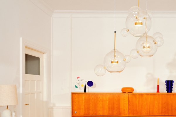 A warm, curated living room filled with vintage furniture and heirloom pieces reflecting the rightsizing journey for Northeast Florida homeowners.
