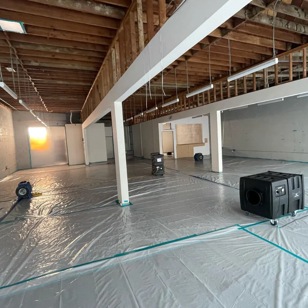 Industrial water extraction equipment deployed in a Long Beach property by What's Next Emergency Response
