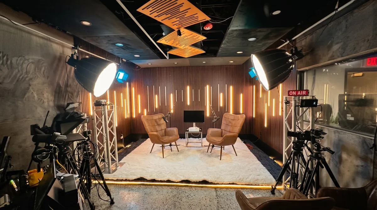 Large feature press clip thumbnail with on-set action shot and cinematic broadcast lighting.
