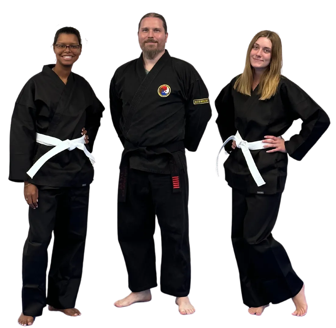 3 adults in black karate uniforms at omega martial arts in plano