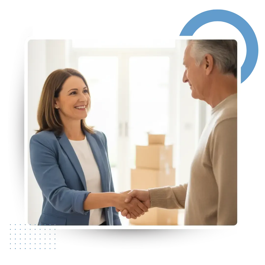 Equity release adviser meeting clients at their kitchen table to explain options