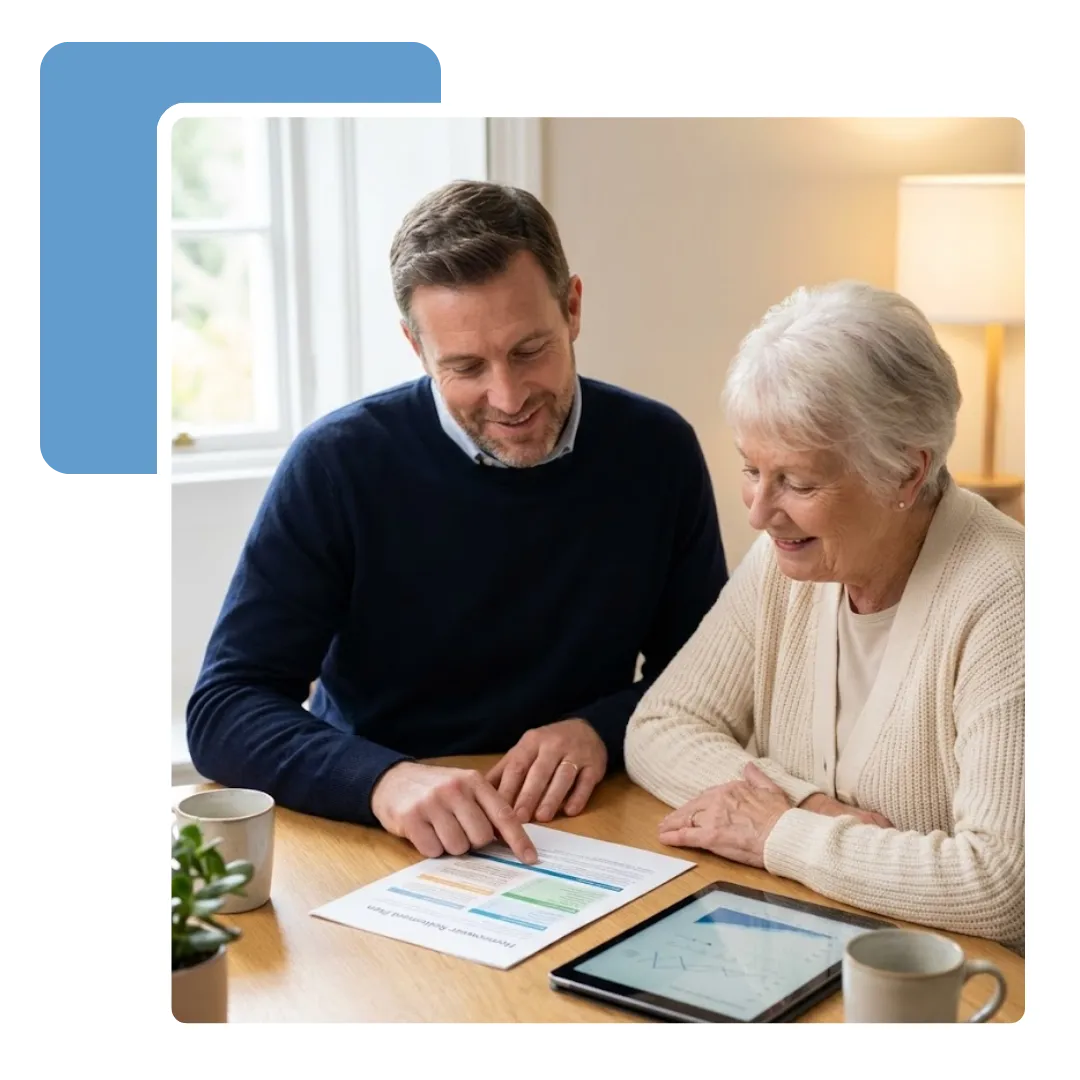 Equity release adviser meeting clients at their kitchen table to explain options