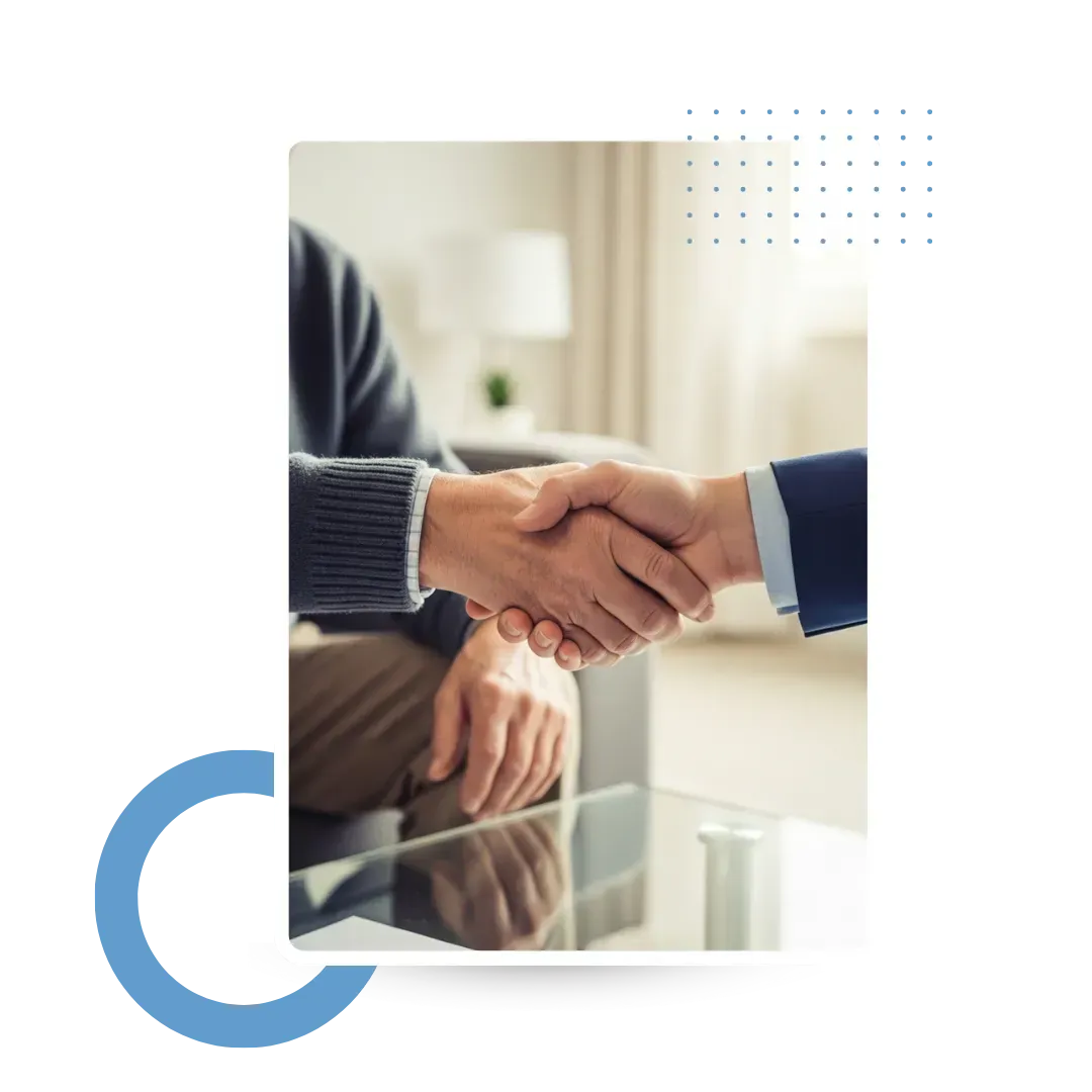 Close up of a warm handshake between a senior client and a professional financial adviser signifying trust and transparent agreement