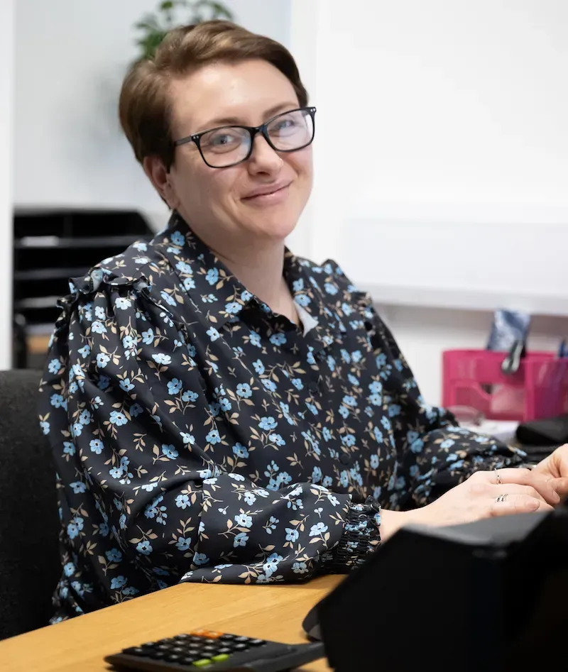 Hayley Kirk, Case Manager at Aspect Mortgages, at her desk in Chorley