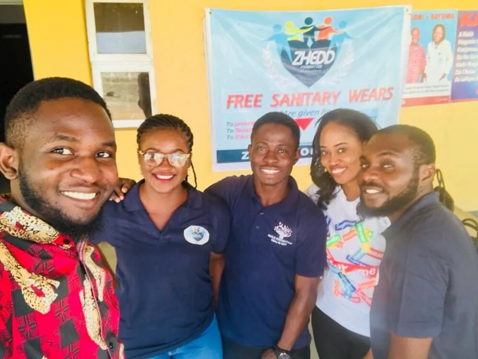 A blue and green spiral on a black background