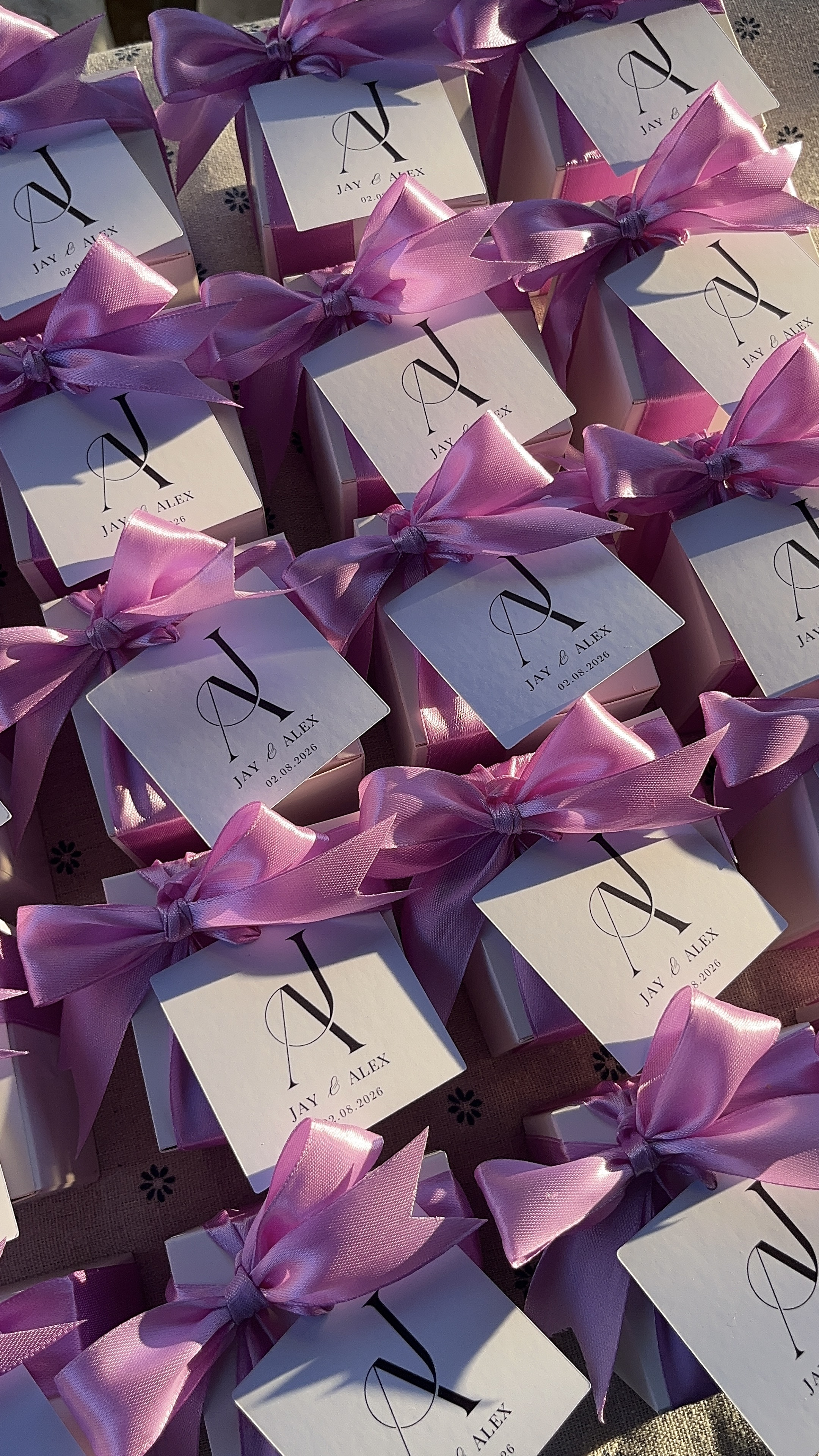 a lit candle on a table in a dark room