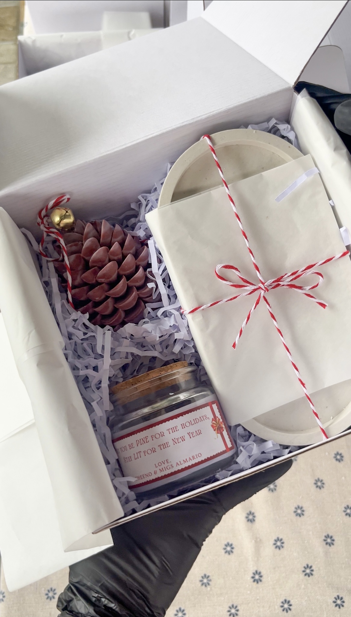 black glass bottle on brown wooden table