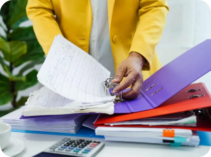 a white wall with a reflection of a coin on it