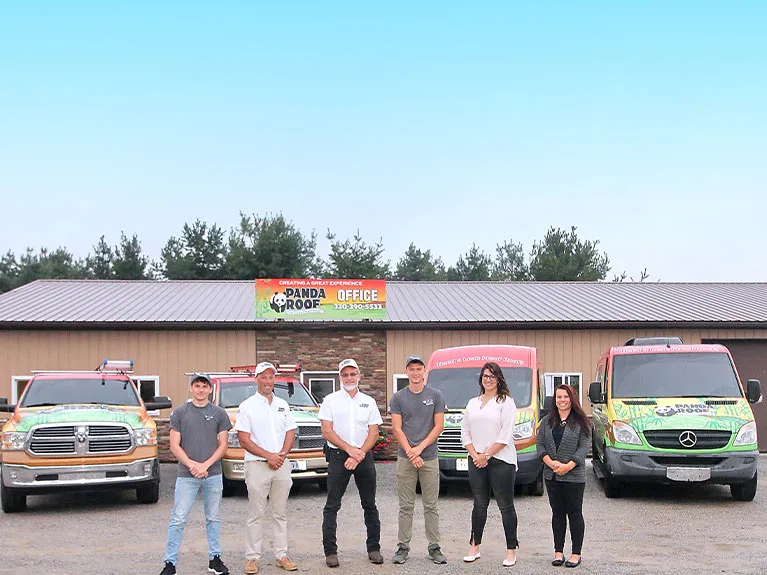 The Panda Roof team standing together outside
