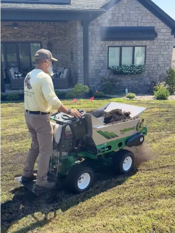 Top Dressing a lawn in Arkansas