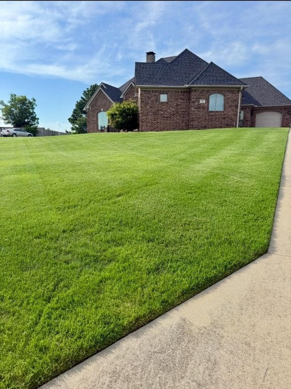 Lawn dethatching services in Cabot, Arkansas by Mallard Island Lawn Service