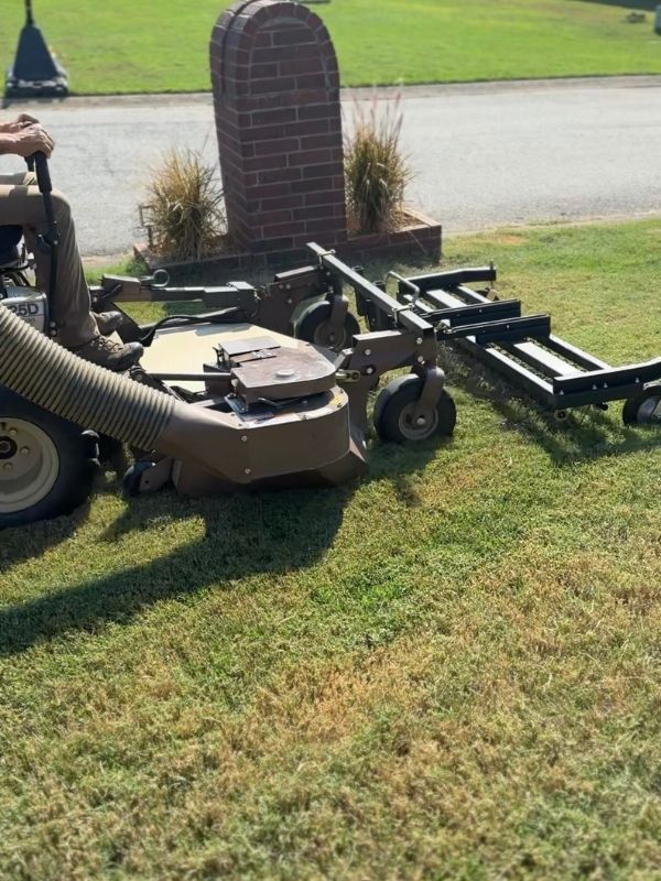 Dethatching a lawn in Cabot, Arkansas