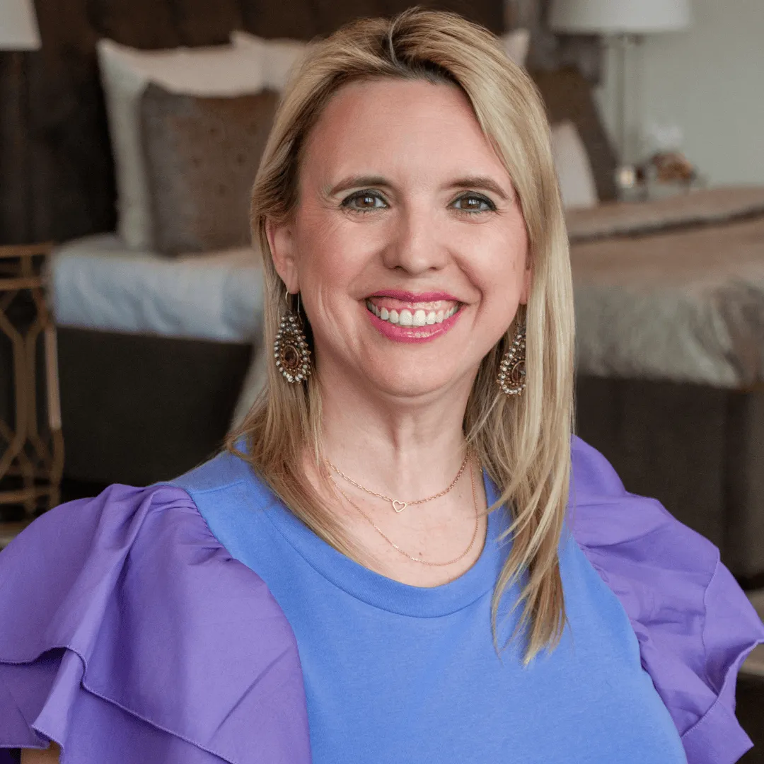 Portrait of Jax Crider, professional studio shot, purple-blue wardrobe, transparent background