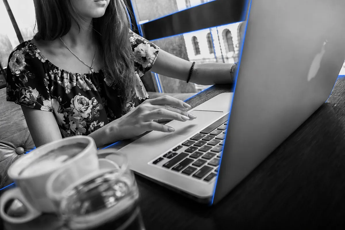 Grayscale enterprise professional reviewing direct bidding data with #3584FA highlights