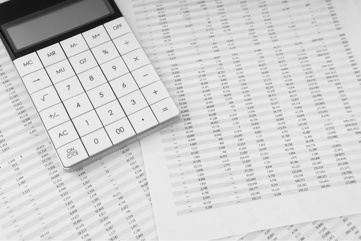calculator with financial statements underneath