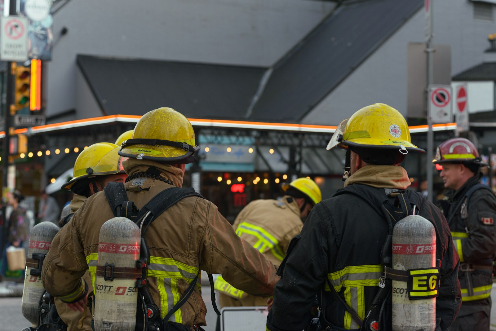 Team of firefighters and emergency responders coordinating at an incident scene