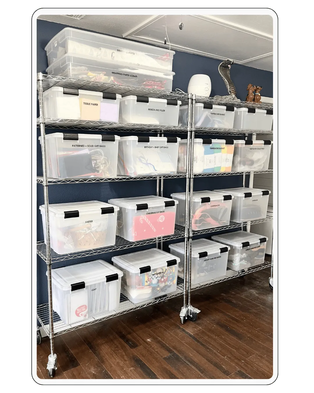 Labeled storage bins organized on metal shelving to create a clean and efficient home storage system