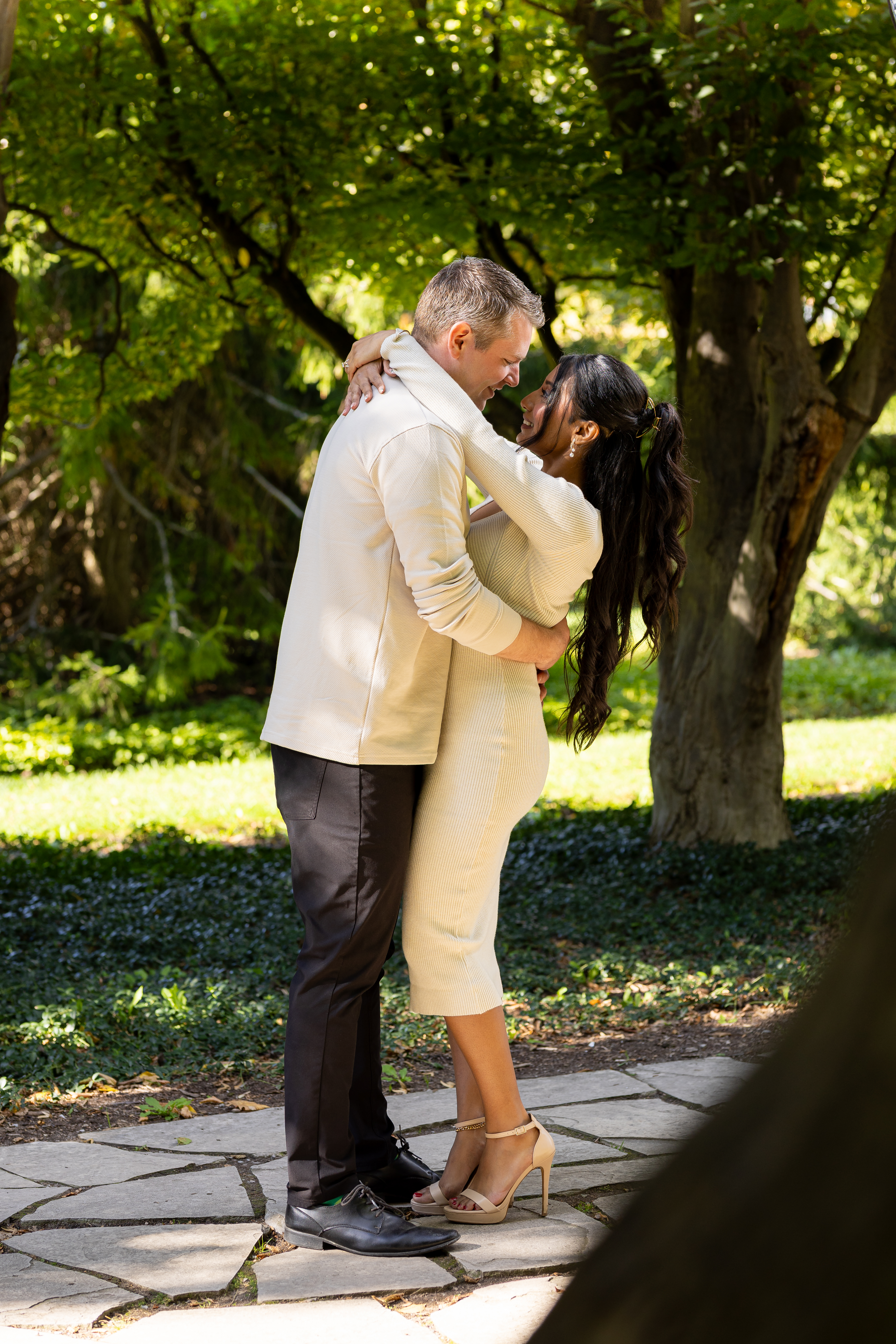 a palm tree on a beach with the ocean in the background