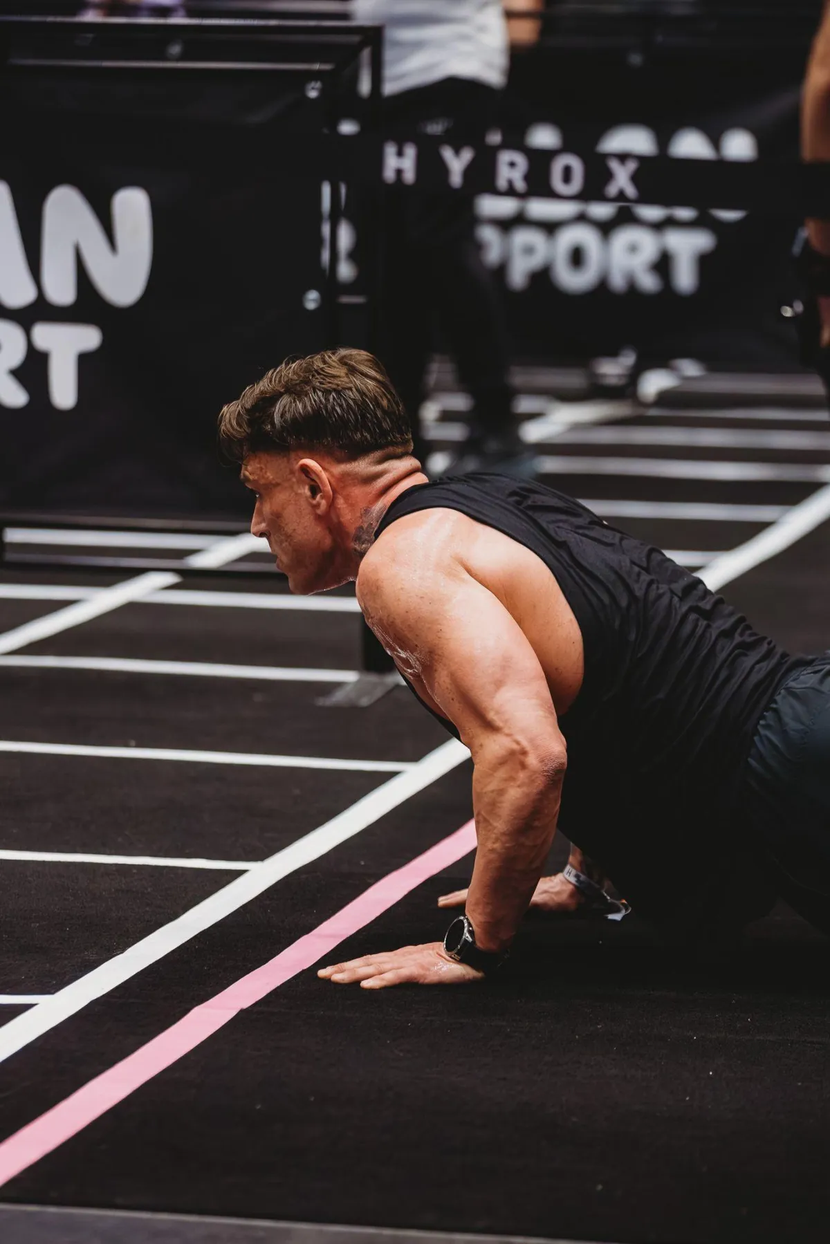 a person standing in front of a sign