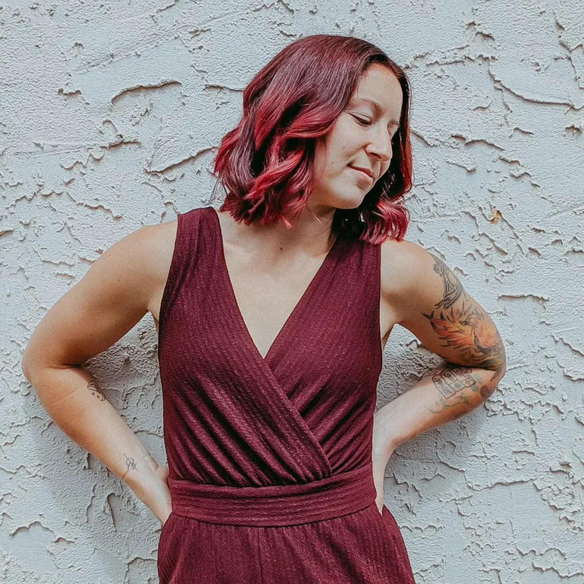 woman in red bikini bottom with chocolate cake on her lap