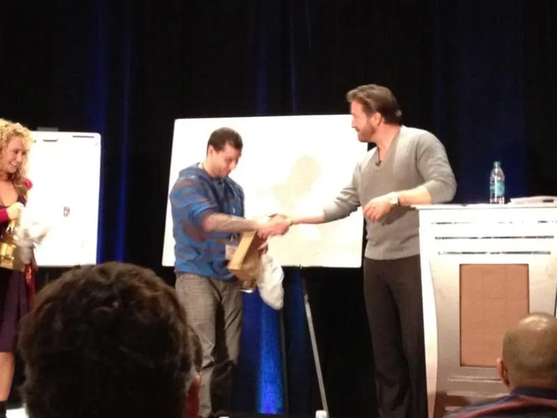 Tristan Bull as a student of Frank Kern at a marketing event, learning advanced digital marketing strategies.