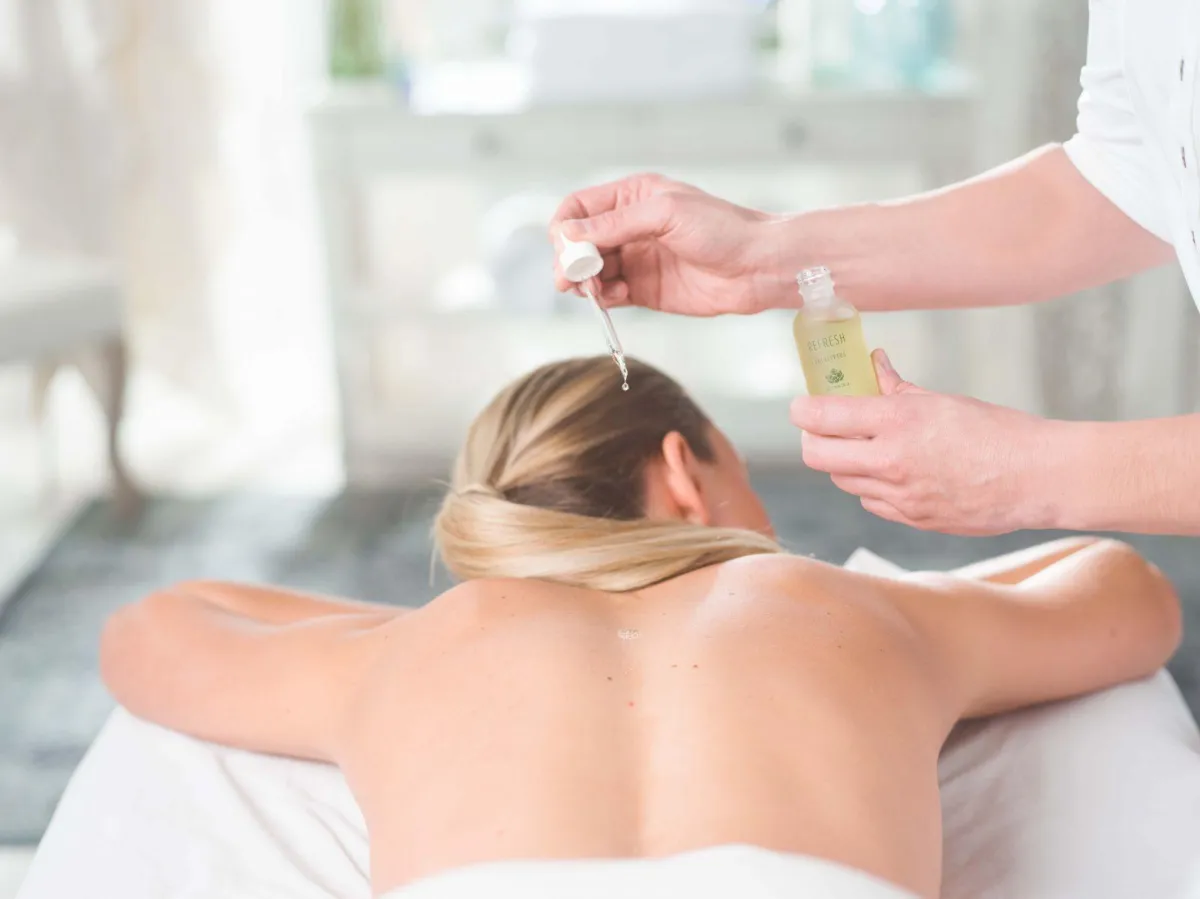 Applying Essential Oils for Aromatherapy Massage in Kirkland