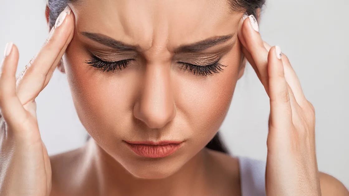Woman Suffering from Tension Headache and Stress