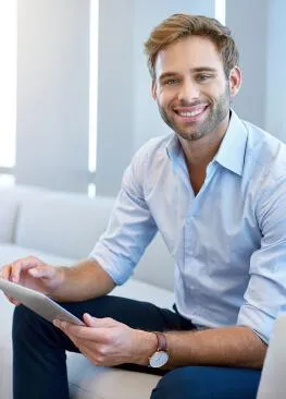 man holding ipad