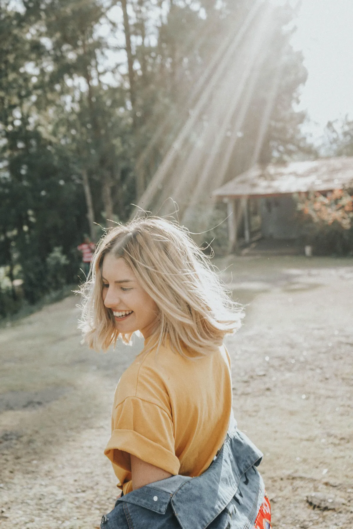 Happy woman smiling confidently outdoors