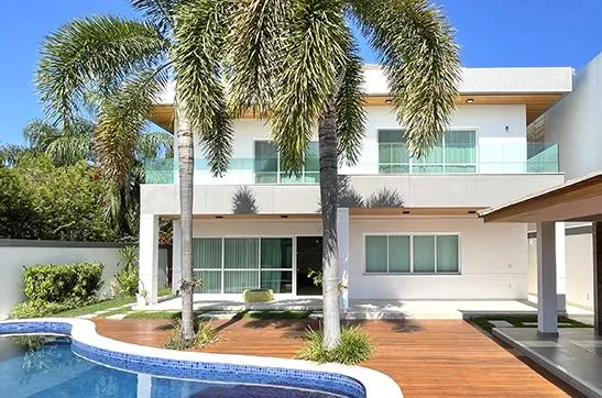 a bowl of fruit sitting on a kitchen counter